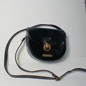 Polo Ralph Lauren Polo ID leather saddle bag in black calf leather. Crossbody